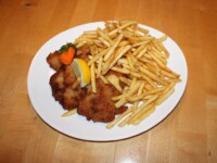 Schnitzel "Wiener Art" mt Pommes Schnitzel "Wiener Art" mt Pommes Frites