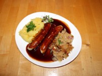 2 Stück Bratwürste mit Sauce und Kartoffelsalat, hier Zusatzbestellung Sauerkraut 2 Stück Bratwürste mit Sauce und Kartoffelsalat, hier Zusatzbestellung Sauerkraut
